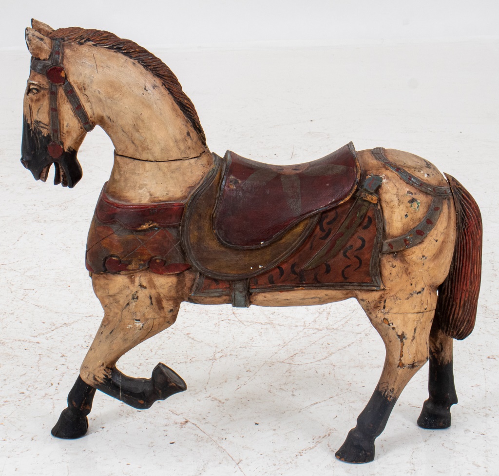 Appraisal: DIMINUTIVE POLYCHROMED CAROUSEL HORSE FIGURE Diminutive polychromed Carousel horse figure