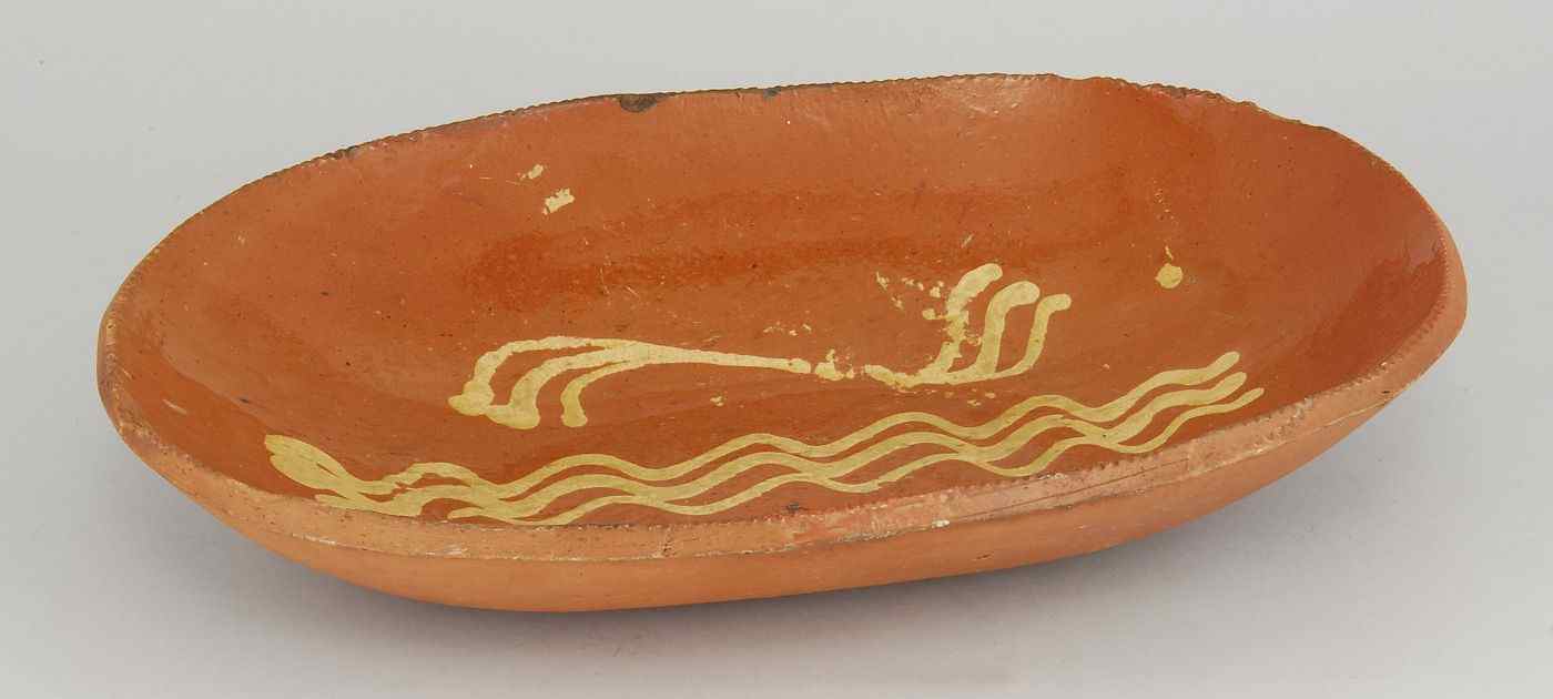 Appraisal: LARGE REDWARE BOWLFirst Half of the th CenturyWith pie-crimped edge