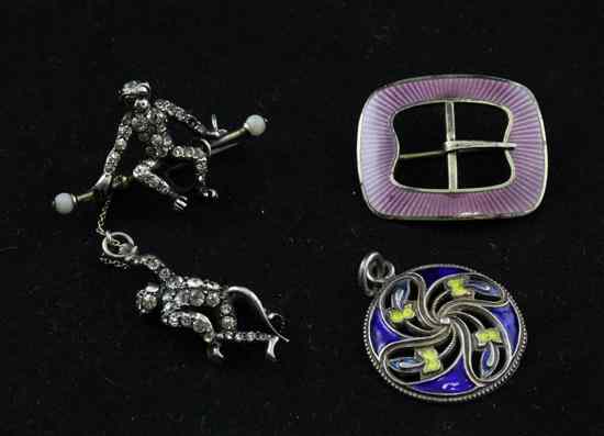 Appraisal: An Edwardian paste set silver monkey bar brooch an enamelled