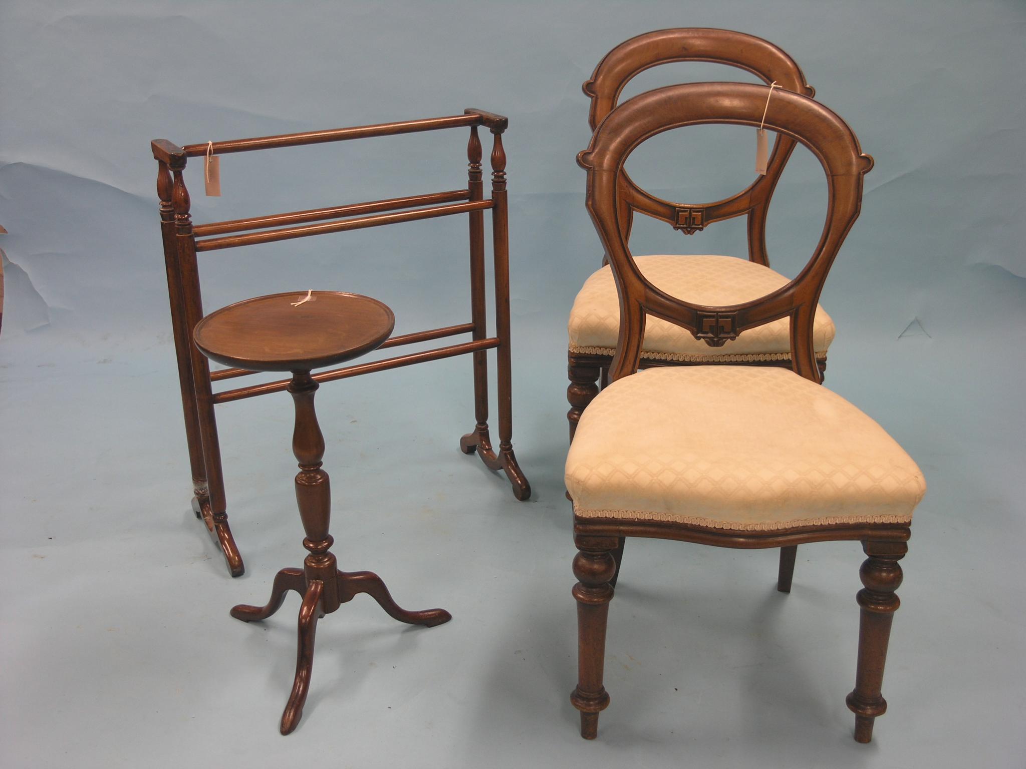 Appraisal: A pair of Victorian mahogany balloon-back dining chairs with upholstered