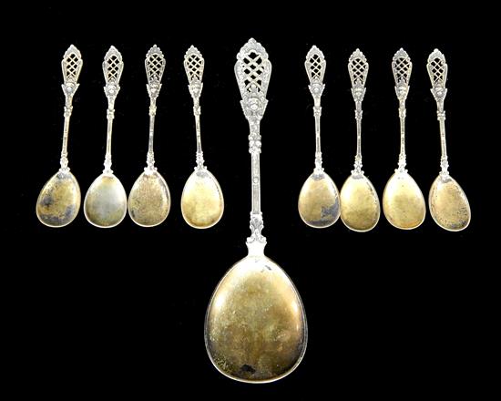 Appraisal: SILVER German silver gilt-washed serving spoon and eight matching teaspoons