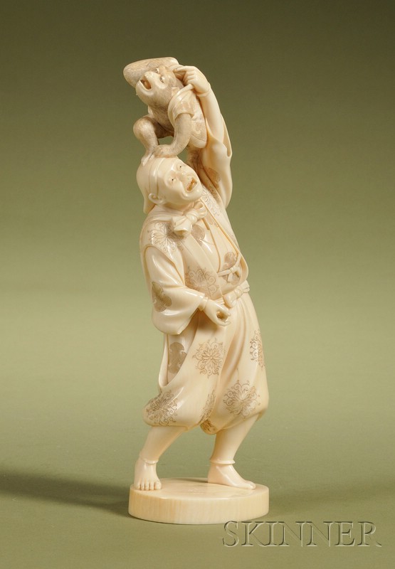 Appraisal: Japanese Carved Ivory Okimono of a Man and a Monkey