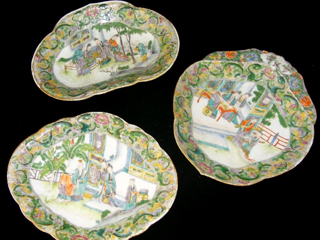 Appraisal: Three various porcelain famille verte shaped plates decorated with figures