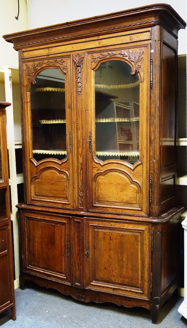 Appraisal: An th century French stained pine buffet du coeur with