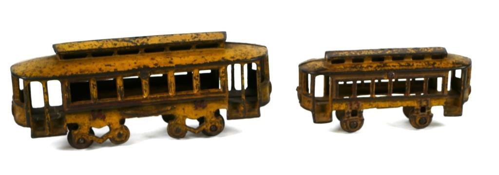 Appraisal: ANTIQUE CAST IRON TROLLEY CARS AND Antique cast iron trolley