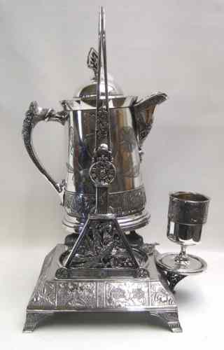 Appraisal: AN AMERICAN VICTORIAN SILVER-PLATED ICE WATER PITCHER on fitted stand