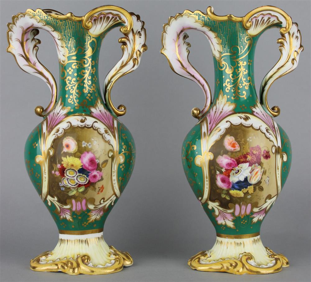 Appraisal: PAIR OF ENGLISH PORCELAIN GREEN-GROUND TWO-HANDLED VASES ca probably Samuel