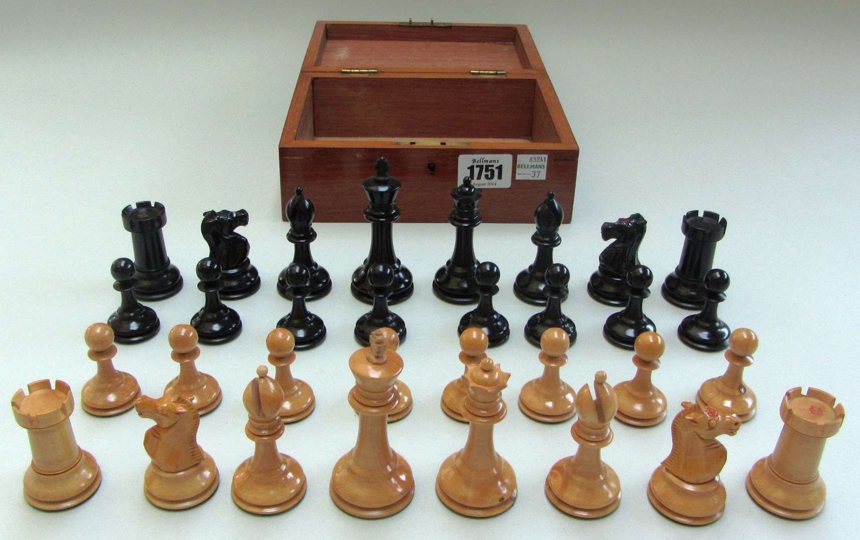 Appraisal: A Staunton style stained boxwood chess set stamped red mark