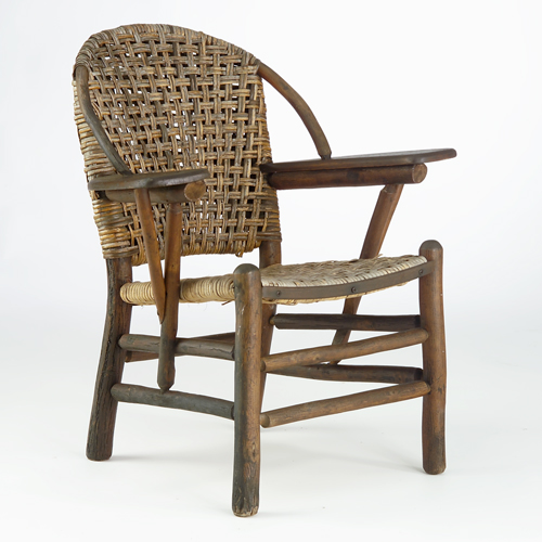 Appraisal: OLD HICKORY Armchair with curved back plank arms and split-reed