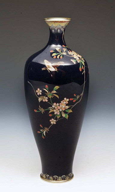 Appraisal: A JAPANESE COBALT BLUE GROUND SLENDER CLOISONNE VASE decorated with