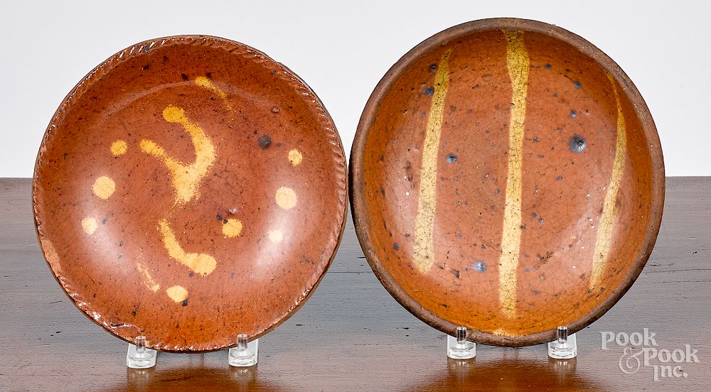 Appraisal: Two miniature redware plates Two miniature redware plates th c