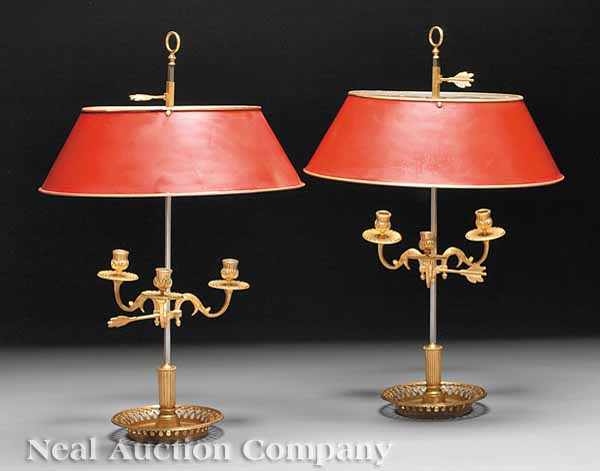 Appraisal: A Pair of Gilt Brass Three-Light Bouillotte Lamps having red