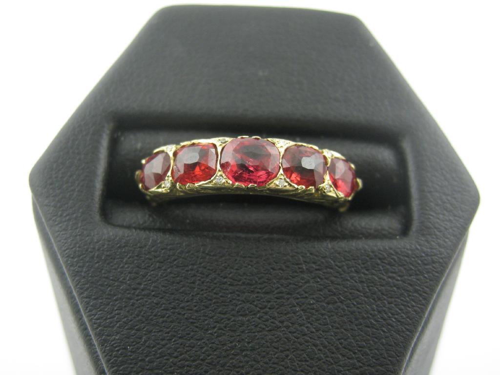 Appraisal: A Red Spinel five stone Ring the graduated cushion shaped