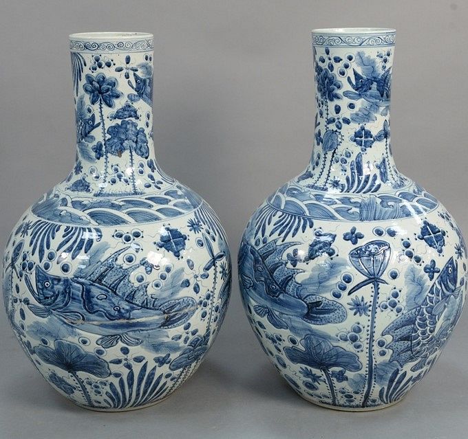 Appraisal: Pair large blue and white vases depicting fish one cracked