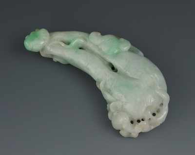 Appraisal: A Chinese Carved Jadeite Turnip Root Ornament Light green to