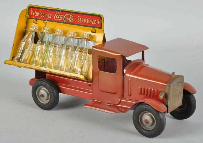 Appraisal: Coca-Cola Metalcraft Toy Truck Description This variation features rubber wheels