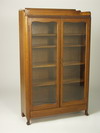 Appraisal: BOOKCASE - Circa - oak two door bookcase simple rolled