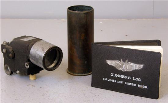 Appraisal: Optical gun sight S - shell casing and a Gunner