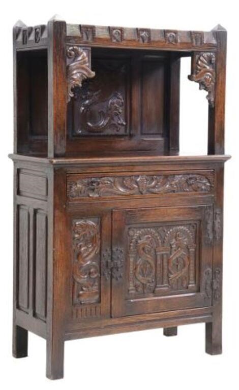 Appraisal: French Renaissance Revival oak cabinet th c having crenellated top