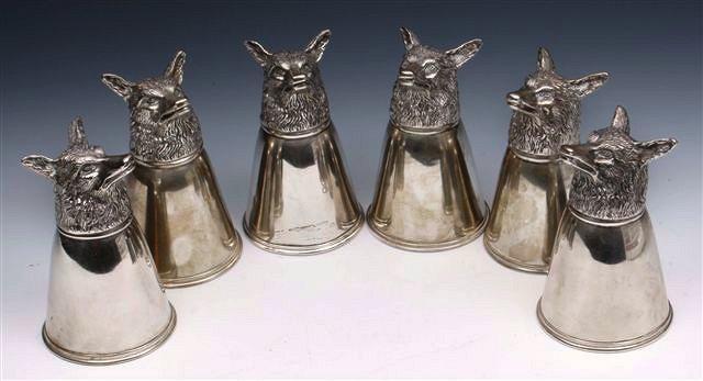 Appraisal: A SET OF SIX STANDARD SILVER STIRRUP CUPS in the