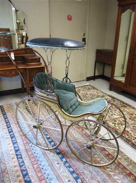 Appraisal: A VICTORIAN BABY CARRIAGE American late th century a surrey