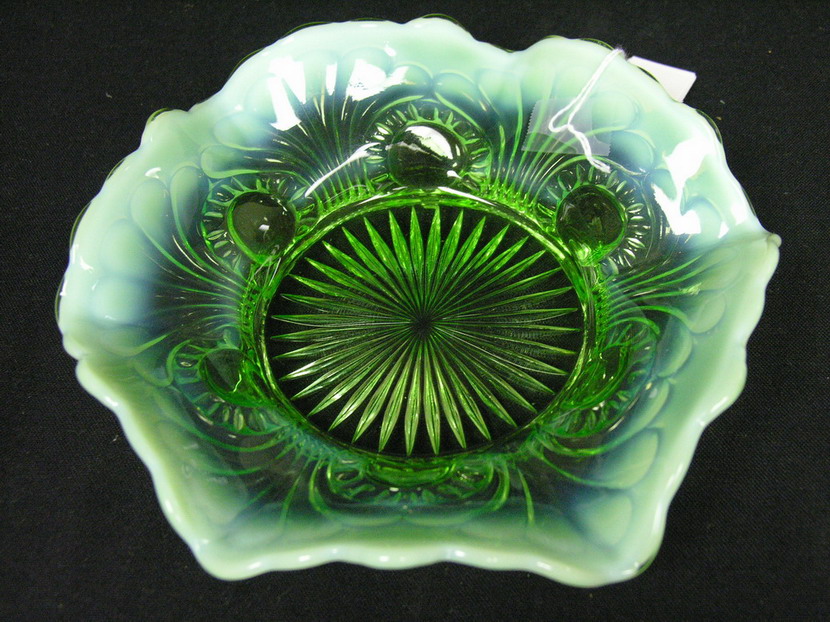 Appraisal: GREEN OPALESCENT FOOTED BOWL Size with diameter