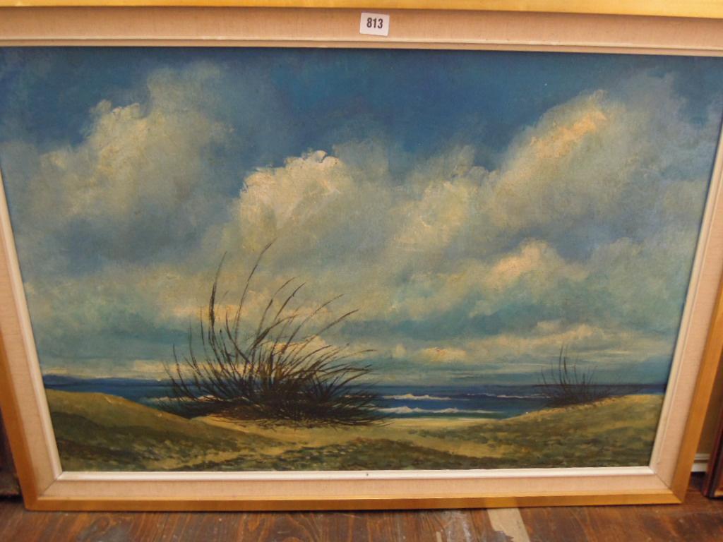 Appraisal: An oil painting on board of a coastal landscape signed