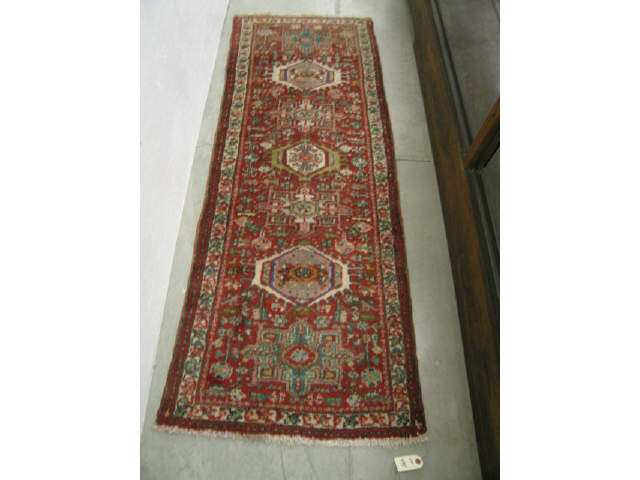 Appraisal: Heriz Persian Handmade Runner geometrics medallions on red field '