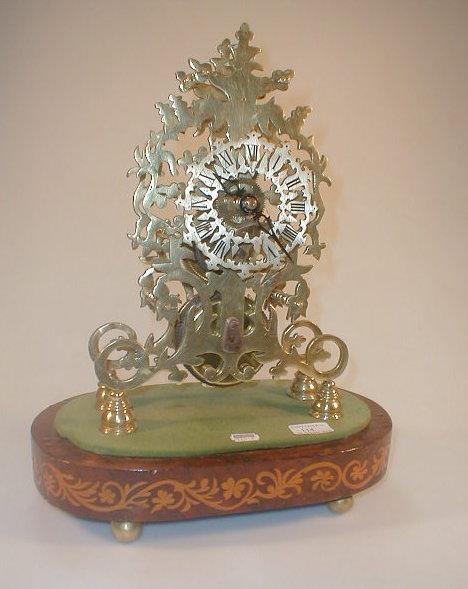 Appraisal: A Victorian style gilt metal skeleton clock with a pierced