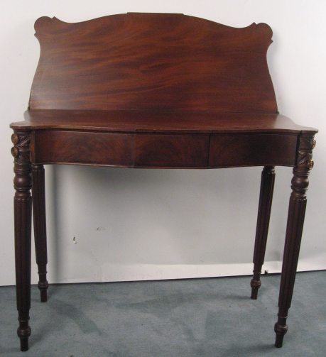 Appraisal: A Mahogany Folding-top Game Table the top fold smaller than