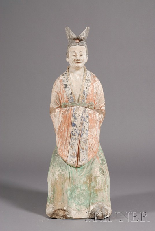 Appraisal: Pottery Figure China Tang style figure of a seated court