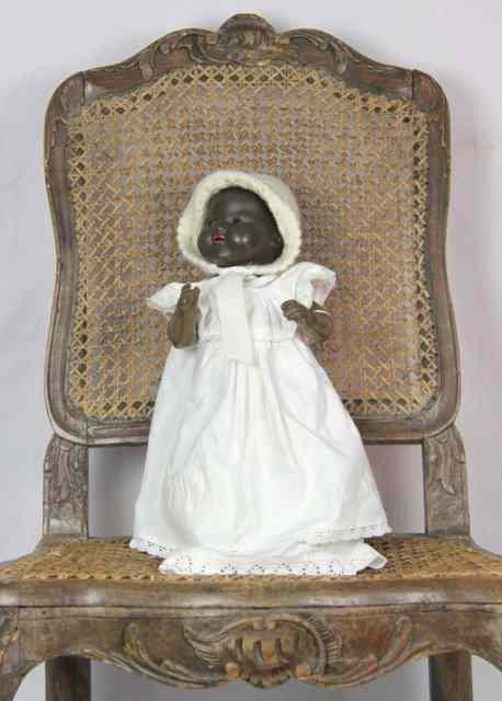 Appraisal: An Armand Marseille Dream Baby black bisque head doll impressed