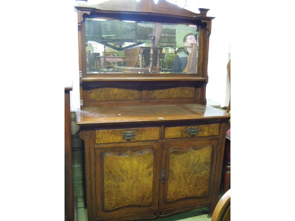 Appraisal: An Edwardian Art Nouveau style mirror backed sideboard with rectangular