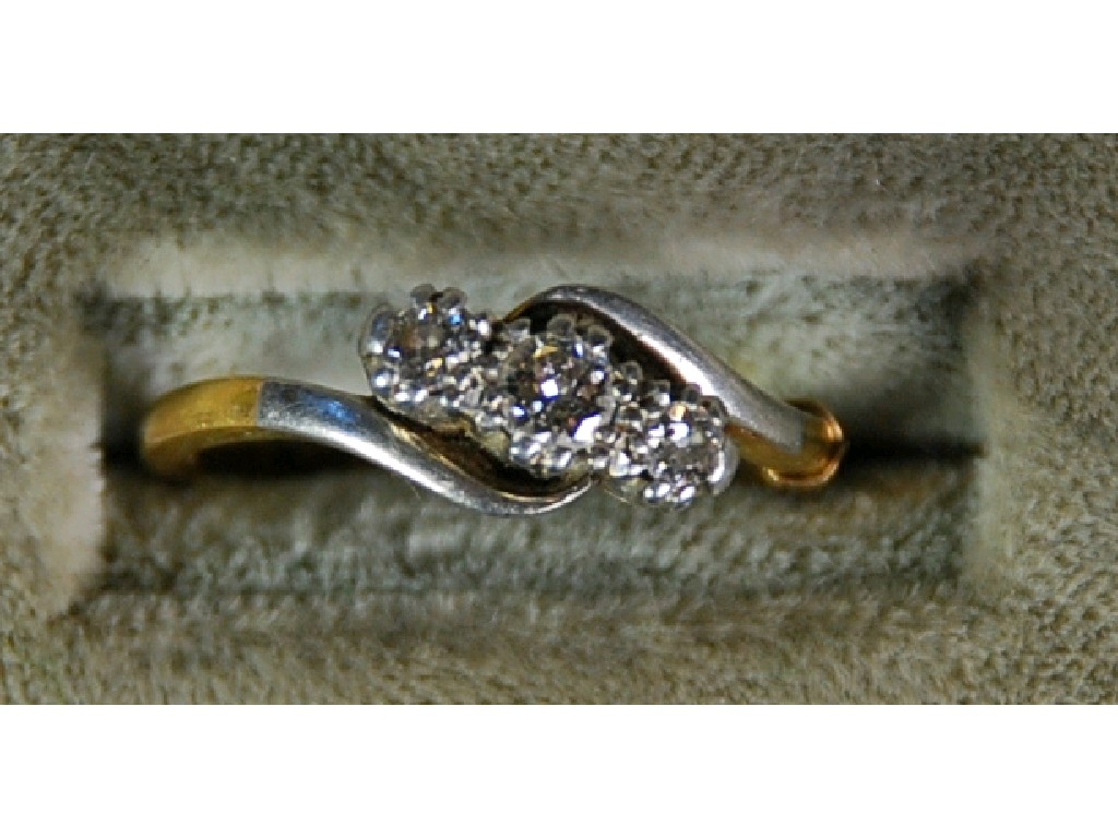 Appraisal: ct GOLD AND PLATINUM CROSS OVER RING claw set with