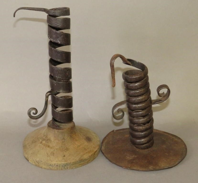 Appraisal: WROUGHT IRON COURTING CANDLESTICKSca th- th century common form coiled