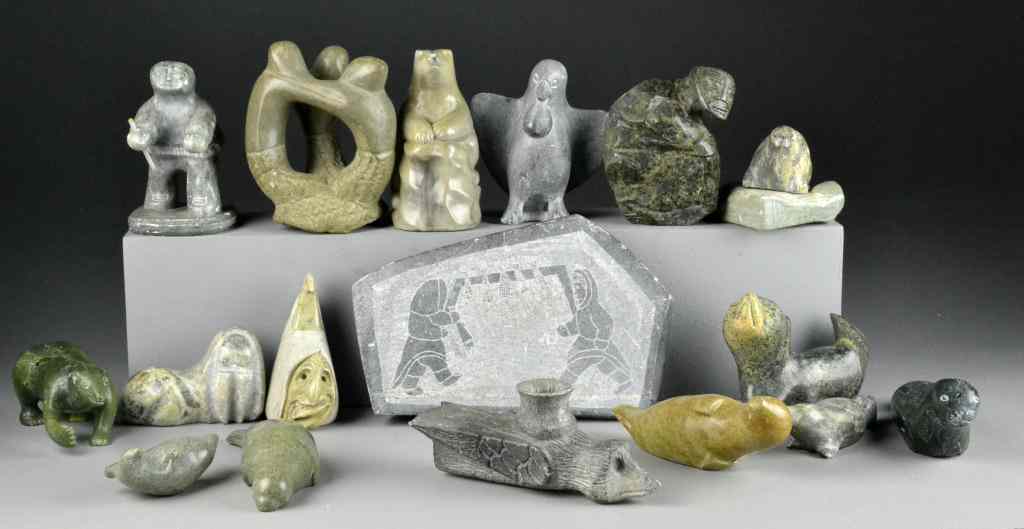 Appraisal: Inuit Stone CarvingsDepicting animals birds and figures including one pipe