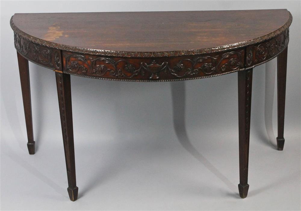 Appraisal: ADAM STYLE CARVED MAHOGANY DEMILUNE TABLE having a demilune shaped