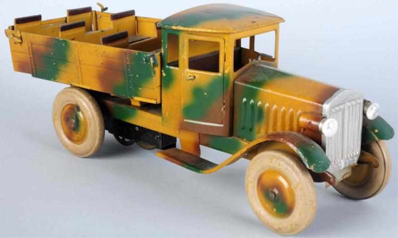 Appraisal: Lineol Clockwork Tinplate Troop Truck Electric lights Motor is sluggish