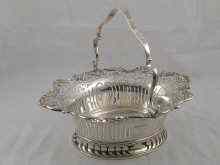 Appraisal: A pierced silver swing handle basket Mappin and Webb Birmingham