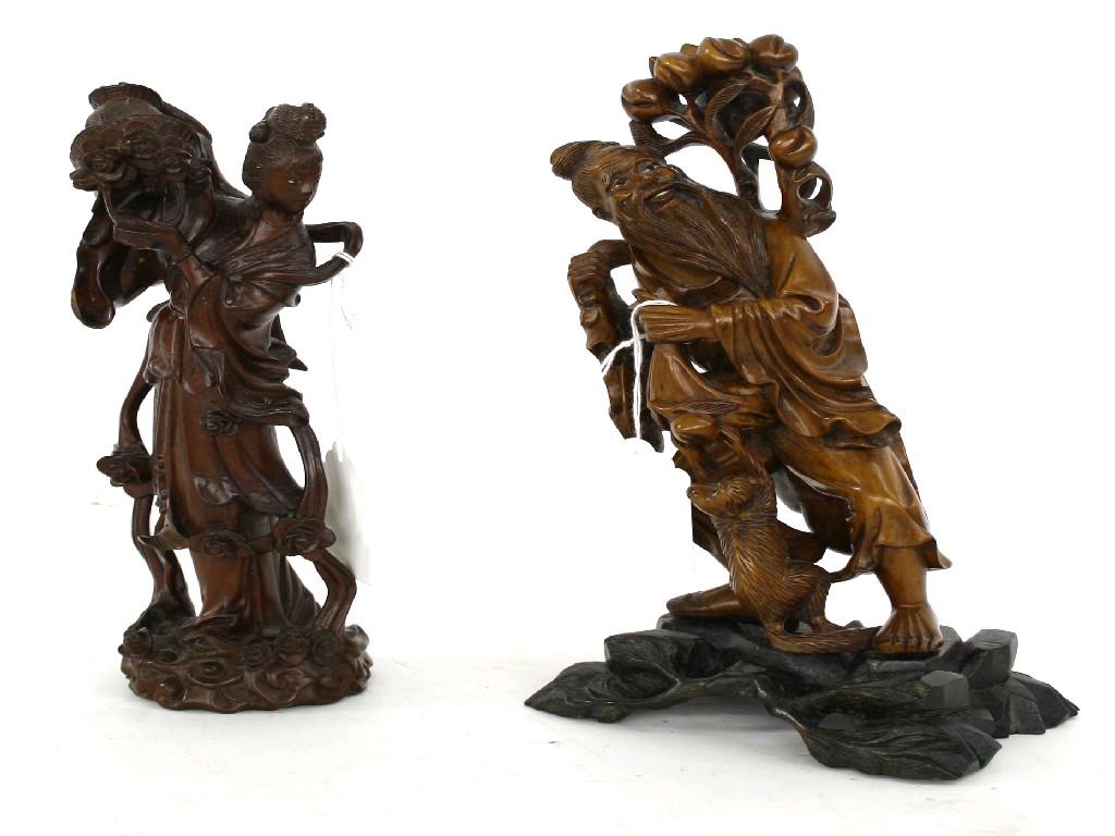 Appraisal: Japanese root carving modelled as a sage carrying a branch