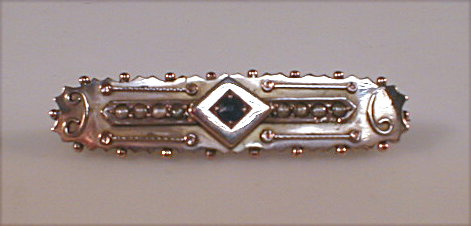 Appraisal: A Victorian bar brooch set with seed pearls and a