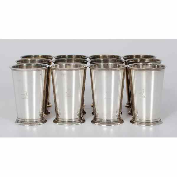 Appraisal: English Silver-Plated Beakers English A set of twelve silver-plated beakers