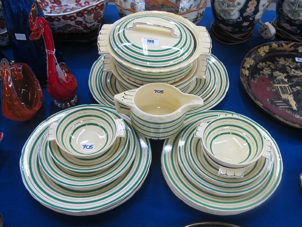 Appraisal: Bovey Pottery green and gilt banded dinner service