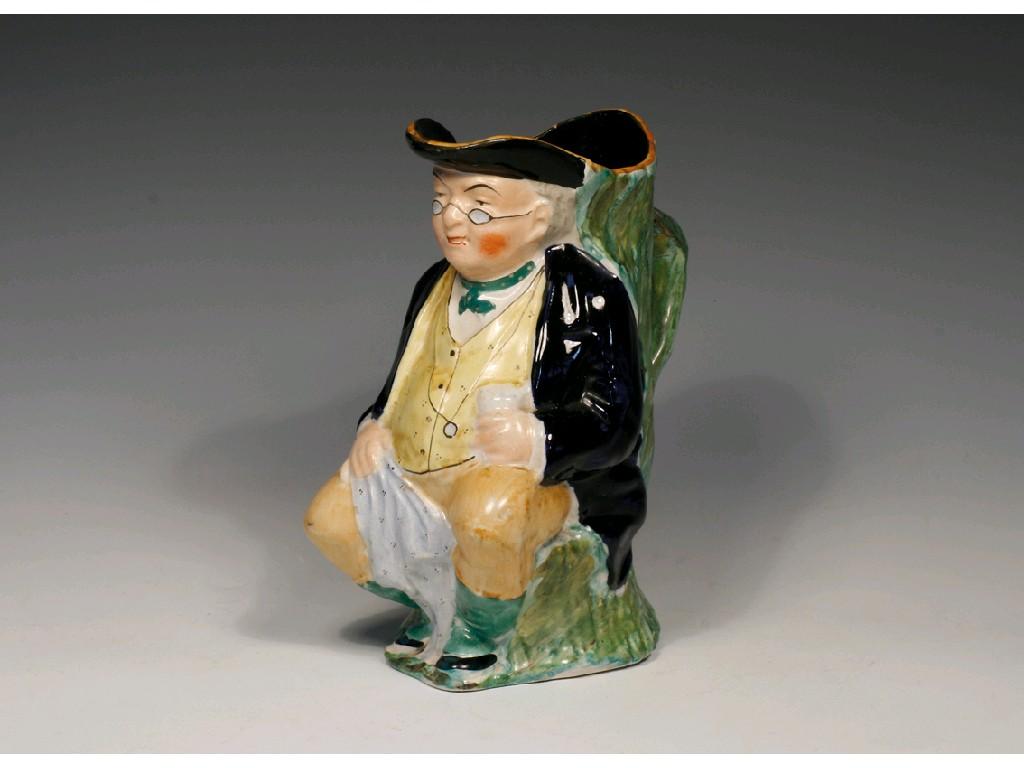 Appraisal: A STAFFORDSHIRE POTTERY MR PICKWICK TOBY JUG modelled seated wearing