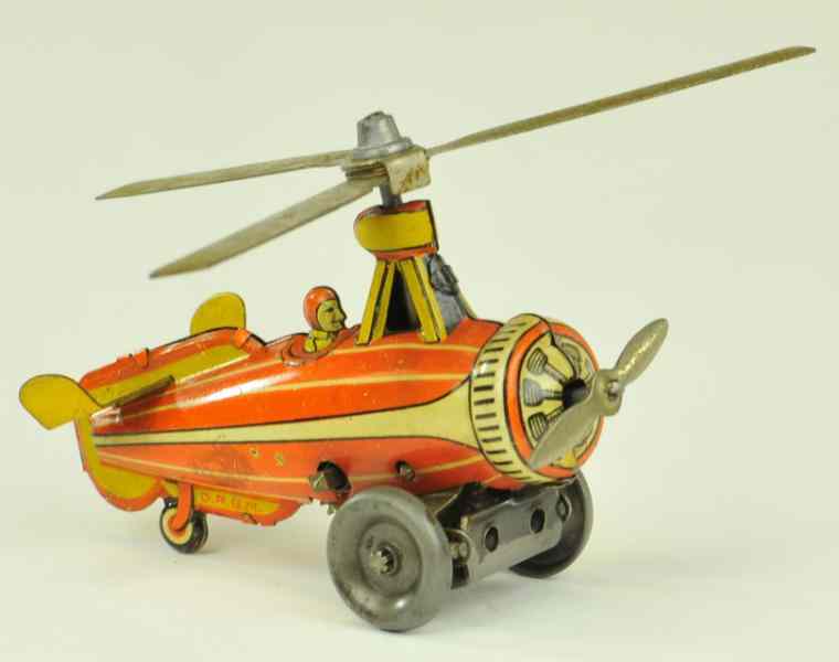 Appraisal: TIN CLOCKWORK AUTOGYRO PENNY TOY Germany tin done in orange