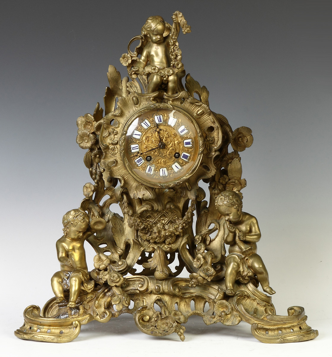 Appraisal: French Gilt Bronze Shelf Clock th cent Cherubs garland some