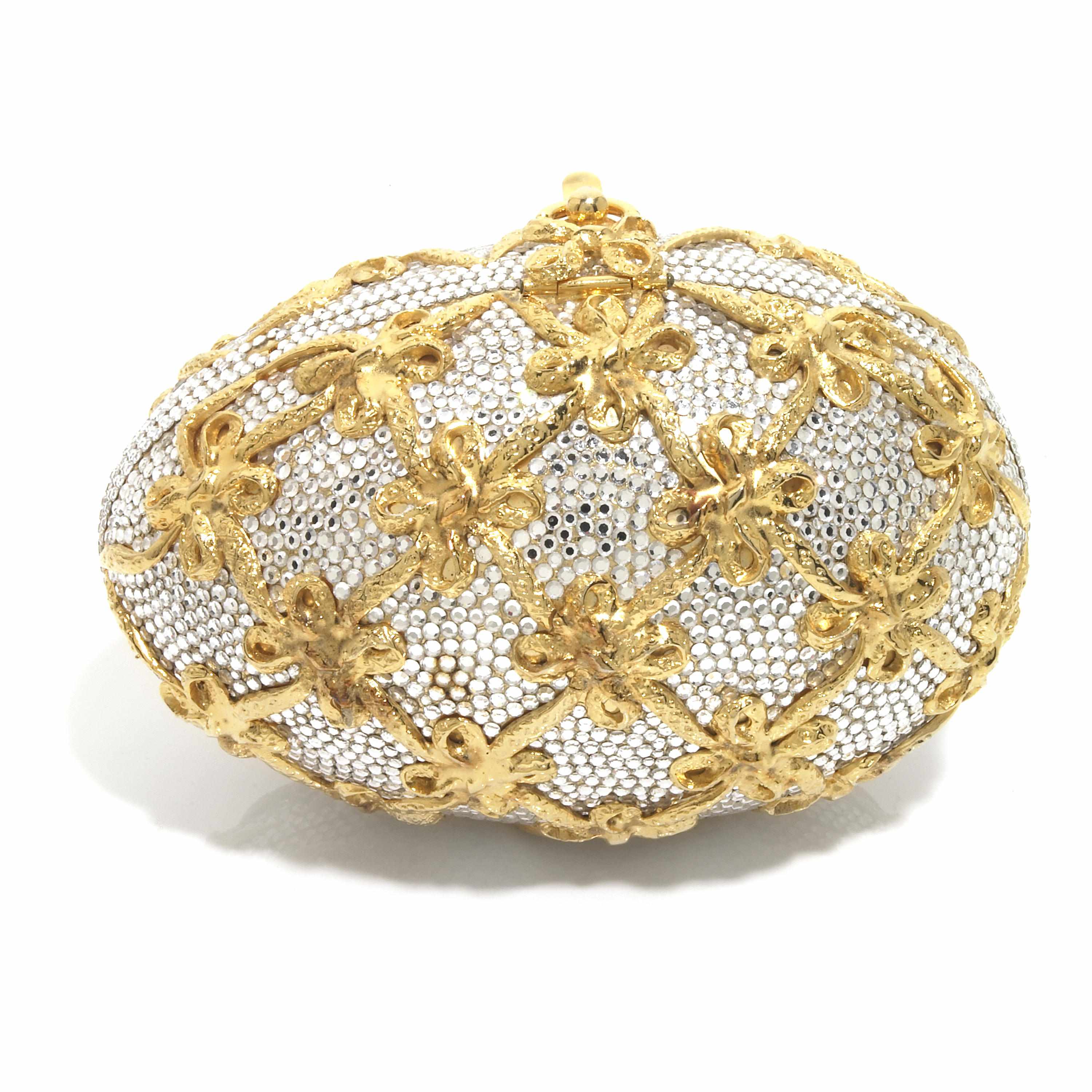 Appraisal: A silver crystal egg purse with gold bows interior with