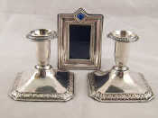 Appraisal: A pair of Finnish silver standard dwarf candlesticks on square