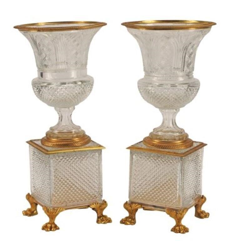 Appraisal: pair Baccarat style cut crystal urns with bronze dore mounts