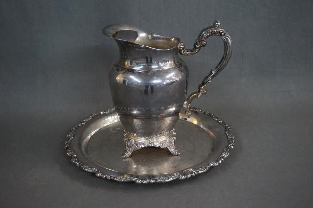 Appraisal: Oneida Silverplate Serving Tray and Water pitcher Includes silver on